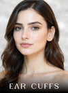 Eda Jewels Dubai collection banner featuring a model wearing the Greta gold plated ear cuff lined with small white pearls, with the text 'EAR CUFFS' overlay at the bottom