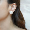 Victoria gold plated oversized pearl stud earrings by Eda Jewels Dubai. Perfect statement daily wear gifting piece.